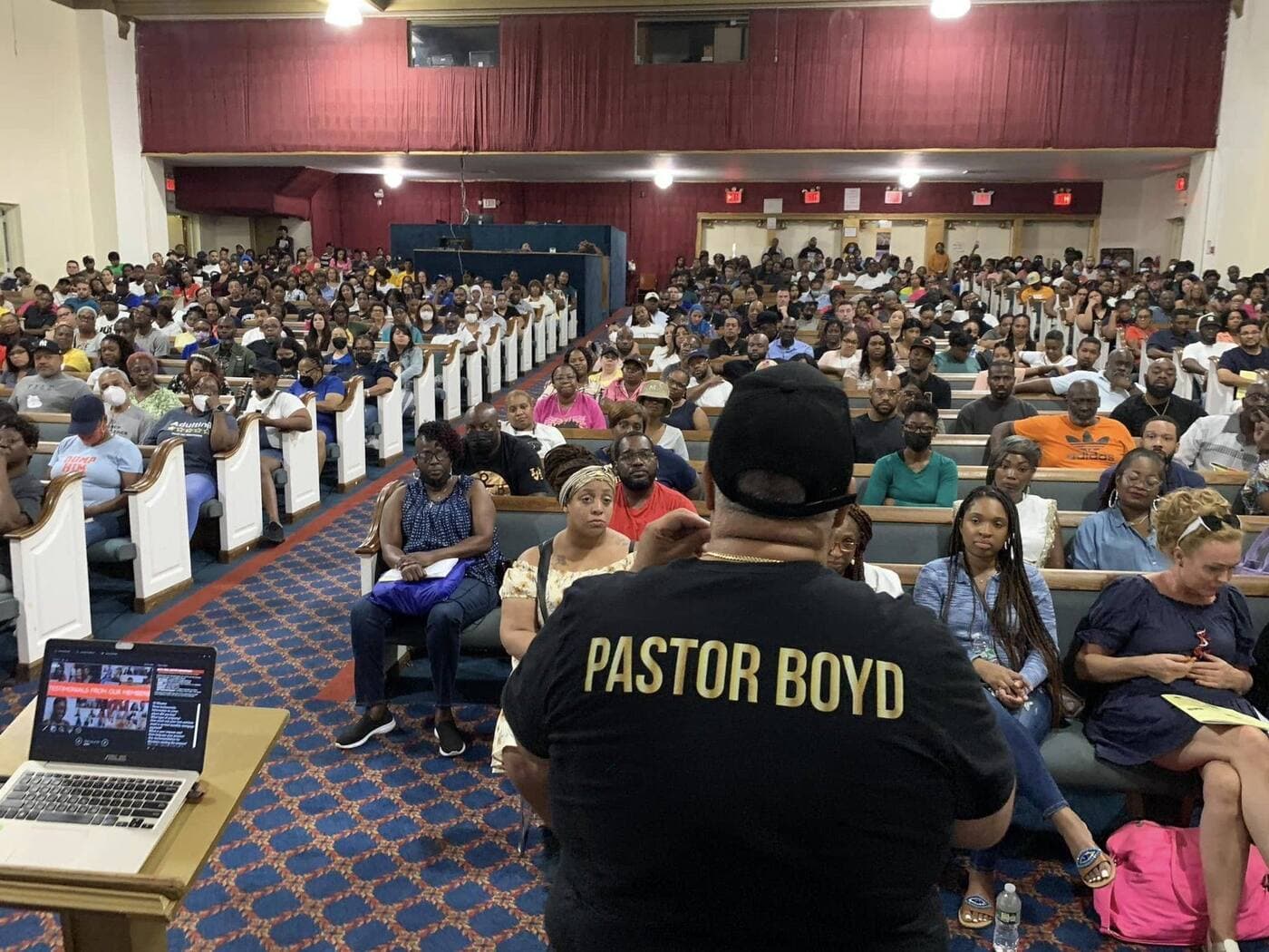 A packed sanctuary at New Greater Bethel Ministries during a service